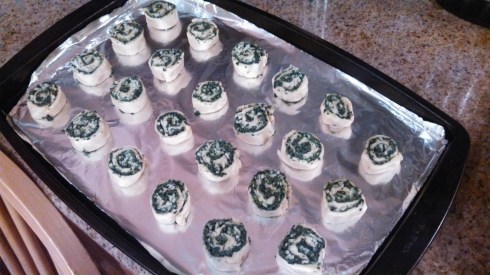 Rolls cut into 1/2" sections and placed on foil lined baking sheet